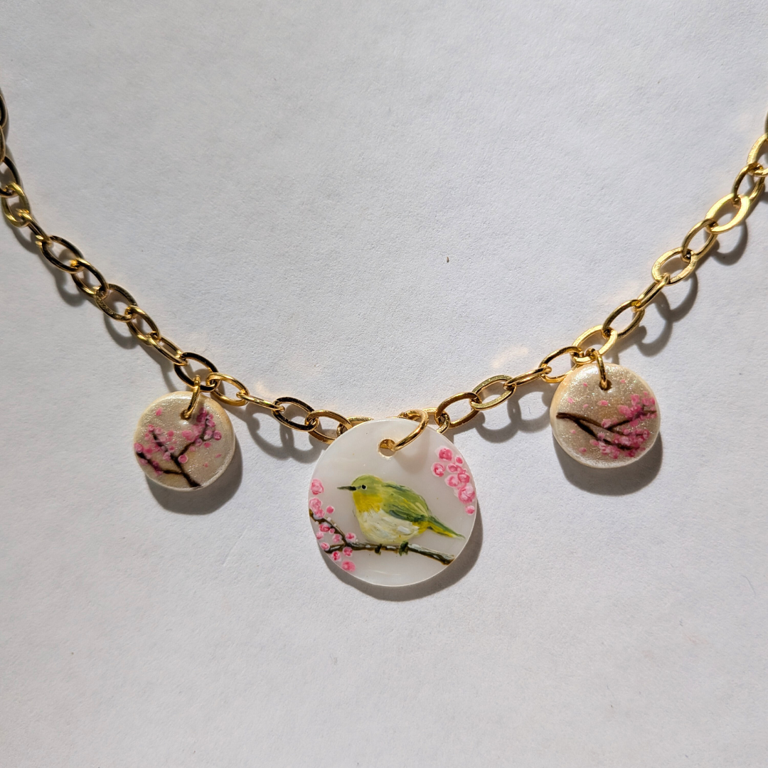 Prunier, rossignol et cerisiers en fleurs