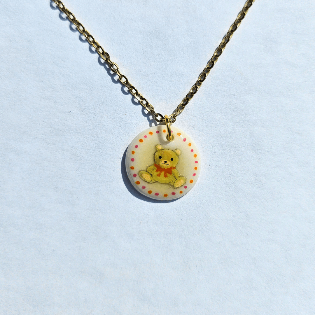 Ourson au ruban orange